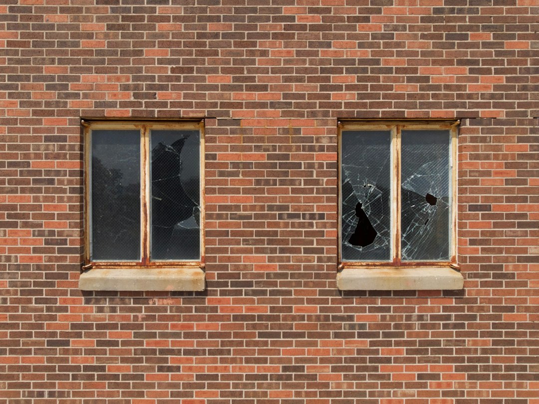 Broken windows in an apartment building