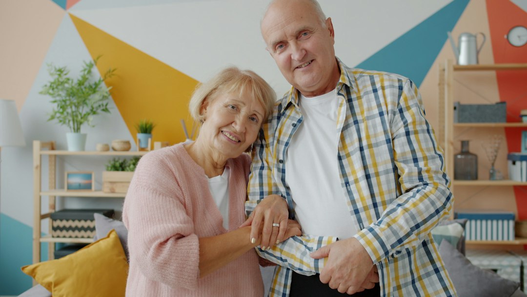 Married couple at home discussing shared renters insurance