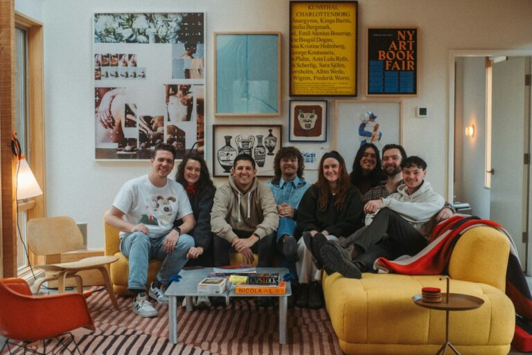 Friends sitting together on a couch