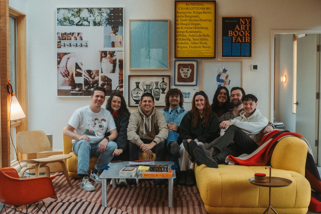Friends sitting together on a couch