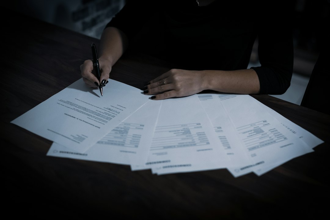 Person signing an insurance policy document